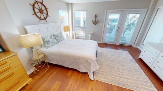1st floor studio features a queen bed and access to the lower deck