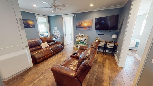2nd living area on the 2nd floor with a 65-inch TV