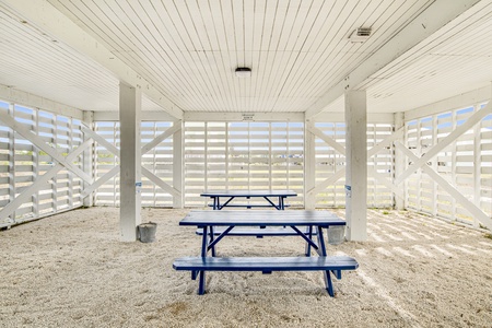 Shaded picnic area under home