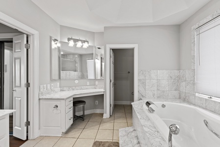 The Master bath has a separate makeup vanity and water closet