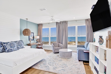 The spacious master bedroom offers a King bed and private, attached bathroom