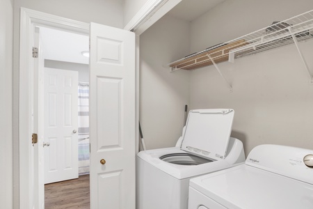 Full size washer and dryer in the hallway