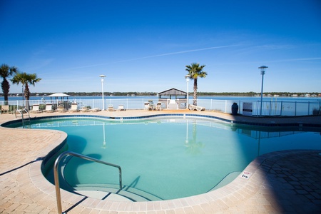 Outdoor pool, hot tub, and  a pier on the Lagoon