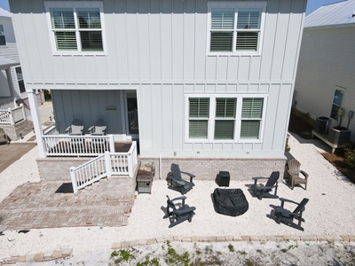 The home has a fire-pit and a gas BBQ grill