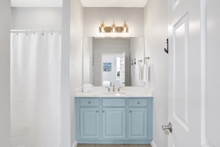 Private bath in Bedroom 3 with a tub/shower combo