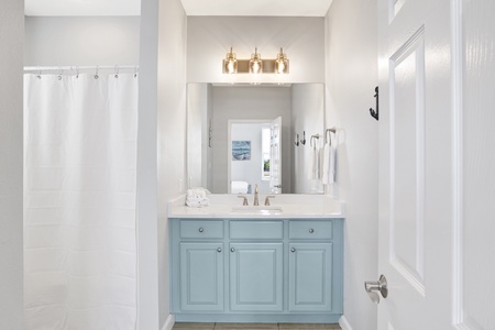 Private bath in Bedroom 3 with a tub/shower combo