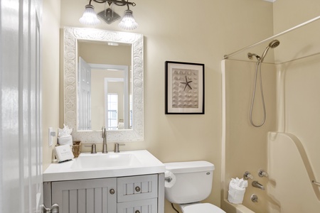 1st floor guest bathroom with tub/shower combo