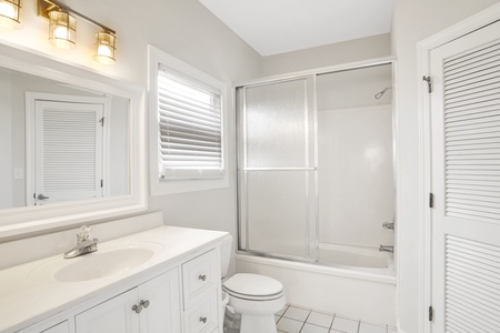 The bathroom by bedroom 3 has a tub/shower combo