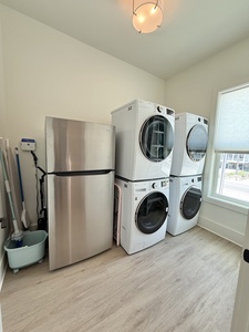 2 full size washers and dryers along with a 2nd refrigerator