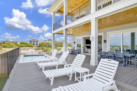 The main balcony is partially covered with plenty of space for the family