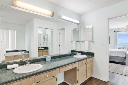 The master bathroom has a double vanity