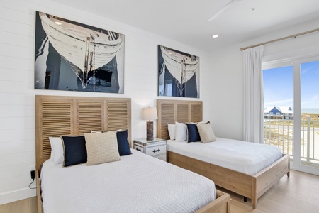 Bedroom 4 has a private bathroom, balcony access, TV and two Queen beds, sleeps 4