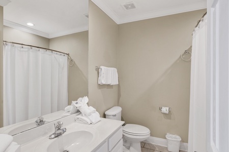 First floor hall bathroom with tub/shower combo