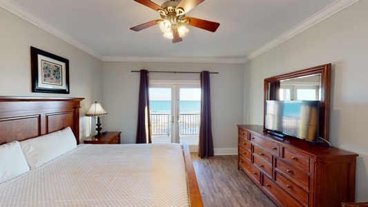 Bedroom 6 features a private bathroom, TV, ceiling fan, Gulf views and balcony access