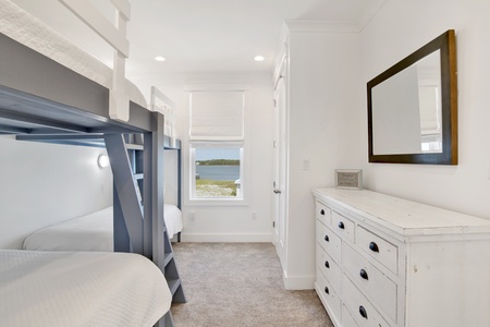 The bunk room (bedroom 2) sleeps 6 guests and has an attached Jack-N-Jill bathroom