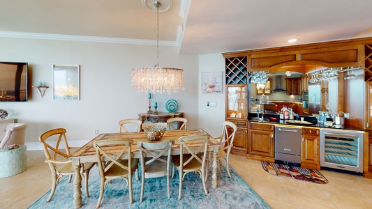 Dining for 8 and a beautiful wet bar complete with a wine fridge and ice maker