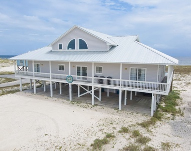 Sand Dollar is a beachfront home on West Beach Blvd with a private beach walk-over