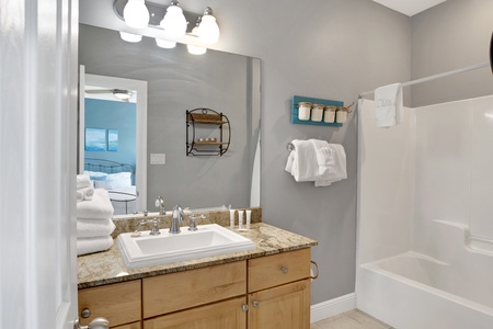 Bedroom 5 bathroom features a shower/tub combo