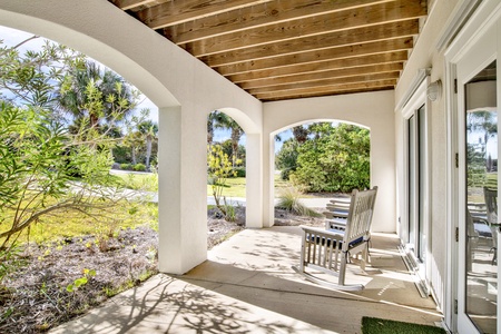 Ground level covered seating and access to the home