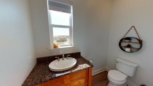 Single bathroom off the kitchen on the top floor