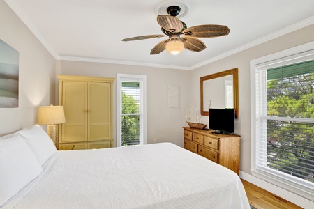 Bedroom 2 sleeps 2 guests and has a TV