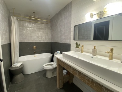 Main level, shared hall bath with soaker tub / shower