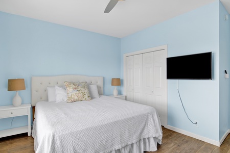The 1st floor bedroom has a TV