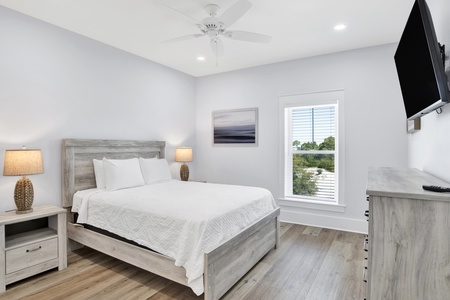 Summertime Blues II-Bedroom 5 on the 2nd floor with a queen bed, ceiling fan, TV and a private bathroom