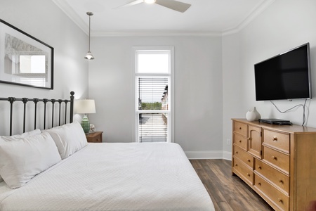 Bedroom 4 has a TV, ceiling fan and a private bathroom