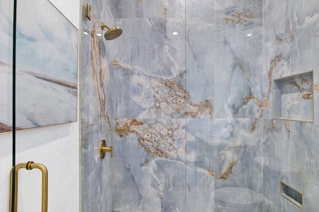 Featuring a walk-in tile shower