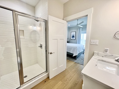 Walk-in shower in the bathroom for Bedroom 5