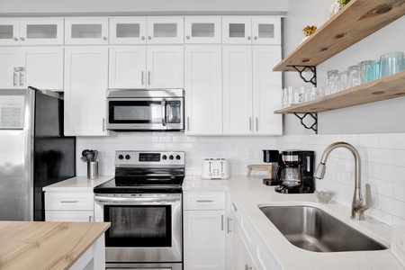 Stainless steel appliances and stone counters