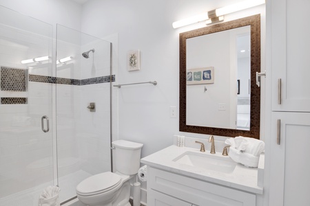 The private master bathroom has a walk-in shower