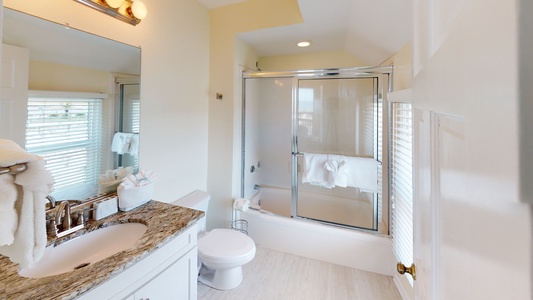 Bedroom 3 private bath with a tub/shower combo