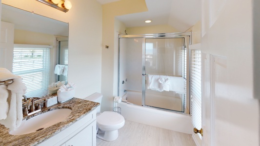 Bedroom 3 private bath with a tub/shower combo