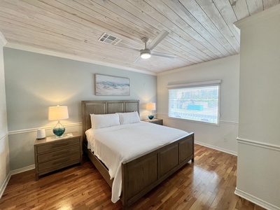 The primary bedroom is located on the main floor