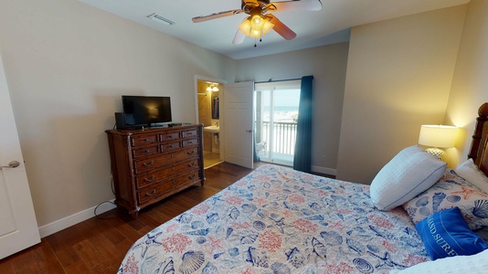 Bedroom 3 is equipped with a TV, Gulf views, balcony access and a private bathroom
