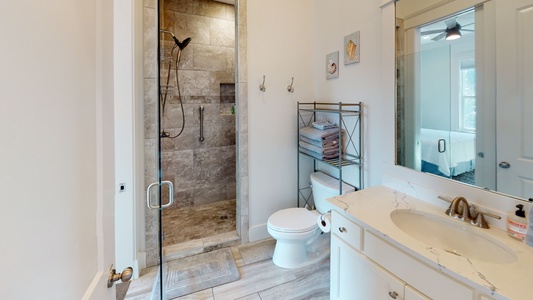 1st floor bathroom with a walk-in shower is attached to Bedroom 2 and also has a hall entrance