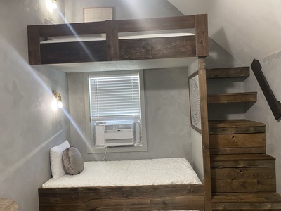 2nd floor Bedroom 4 sleeps 2 with a set of twin bunks, private bath with walk-in shower