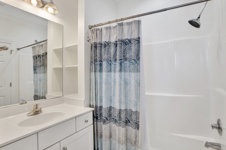 Private bathroom in bedroom 2 with tub/shower combo