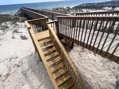 New boardwalk stairs leading to the outdoor shower