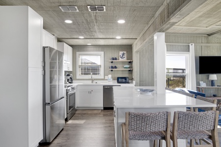 Updated countertops and cabinets with new stainless appliances