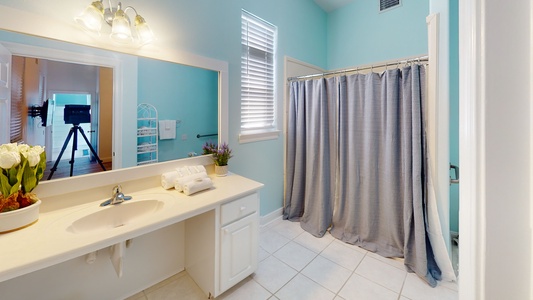 Bedroom 2 located on the main level, private and handicap accessible shower