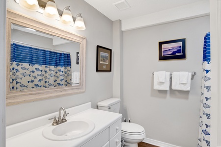 The studio features a private bathroom with a tub/shower combo
