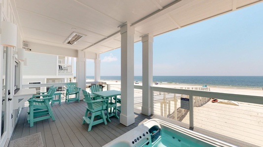 Main level balcony with the spa along with outdoor seating for 6