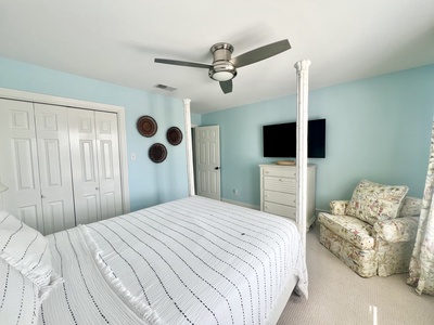 2nd floor guest bedroom with queen bed and TV