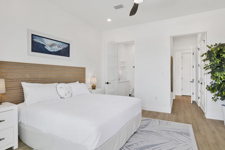 Bedroom 4 offers a King bed, balcony access and private bathroom