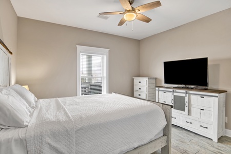 Bedroom 3 comes with a television and ceiling fan