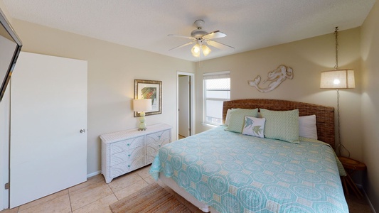 The master bedroom features a King size bed, sleeping up to two guests.