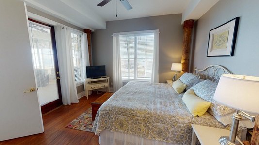 Bedroom 5, 2nd floor, king bed, TV, private bath, access to screened porch with beach views